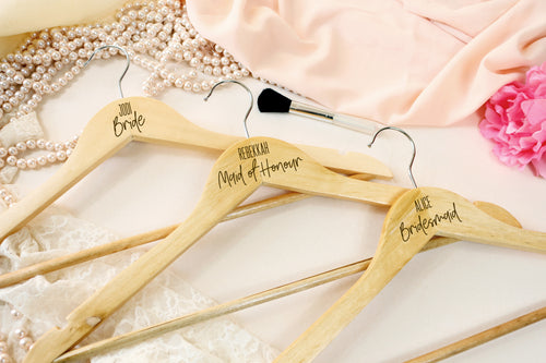 Wooden Coat Hangers with names and bridal titles printed below