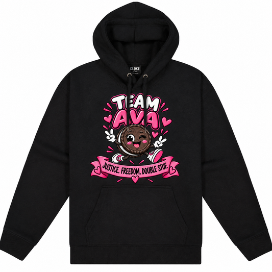 A black pullover hoodie with a colorful graphic on the chest featuring the text 'TEAM AVA' and 'JUSTICE FREEDOM DOUBLE STUF' with a cartoon cookie character and pink hearts, shown on a plain white background.
